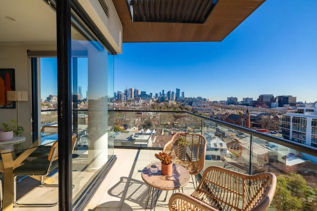 Balcony and Melbourne skyline at Richmond Penthouse